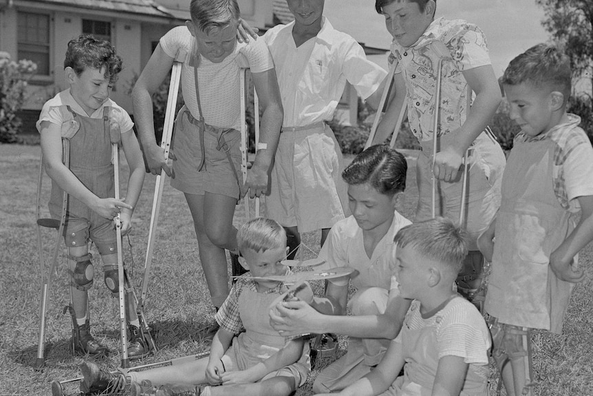 A photo of boys receiving treatment for polio in Australia