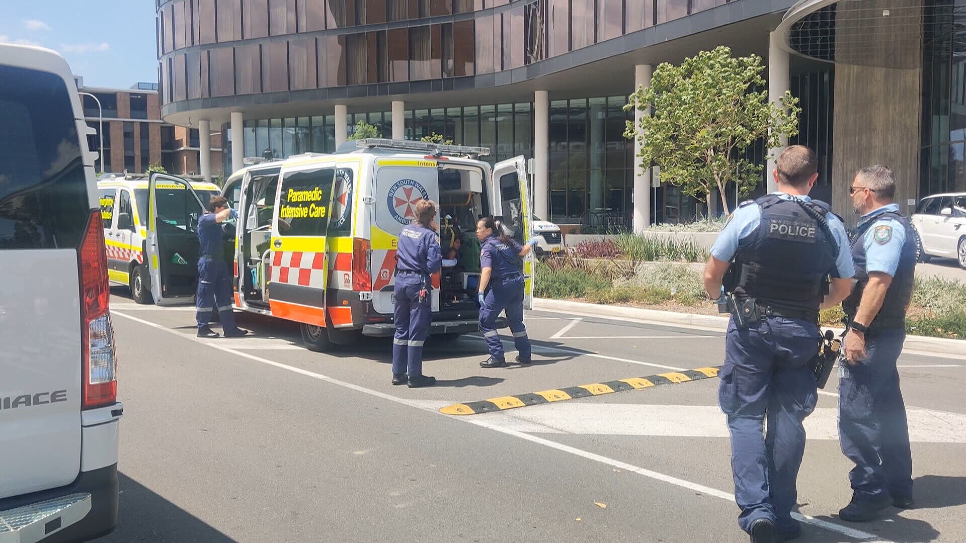 emergency services outside a hotel in penrith where the body of a dead woman was found inside a room