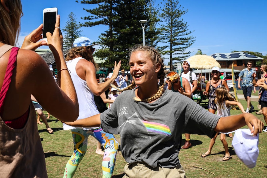 Woman poses for photo at dance party