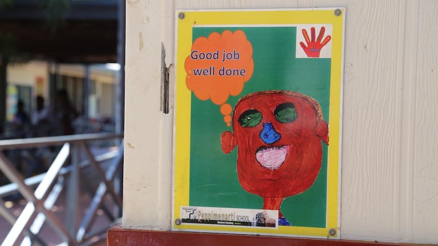 A sign with a face and the words "good job well done".