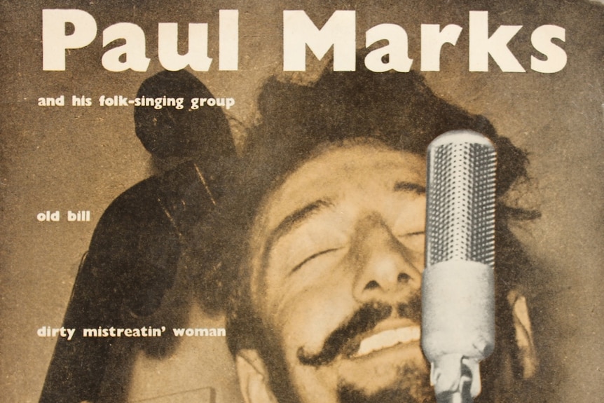 Album cover featuring Paul Marks singing into a microphone, with a double bass in the background