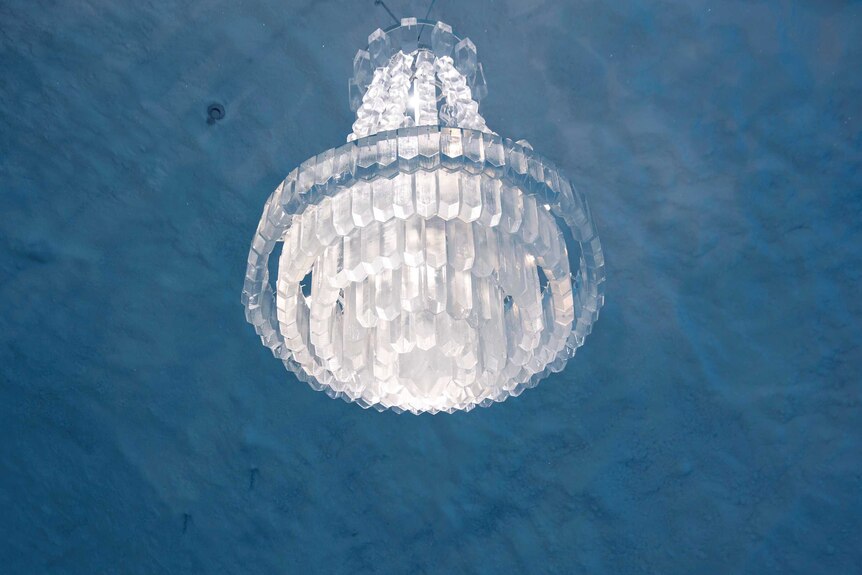A chandelier in the ice hotel made out of 1,000 handmade ice crystals.