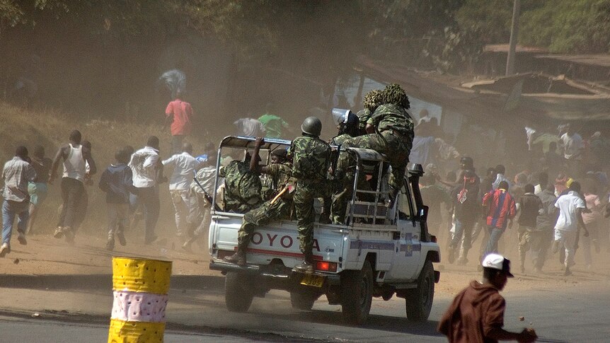 Malawi police chase protesters