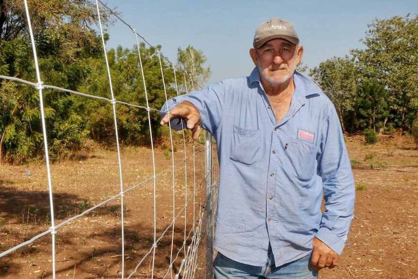 Kununurra Race Club President Garry King with wallaby fence