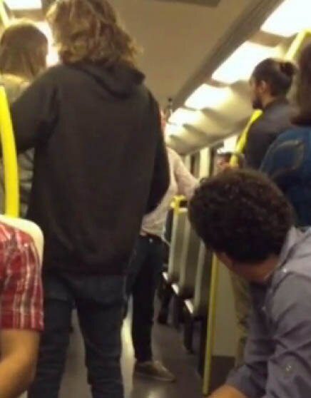 Woman charged over racist Melbourne train rant - ABC News