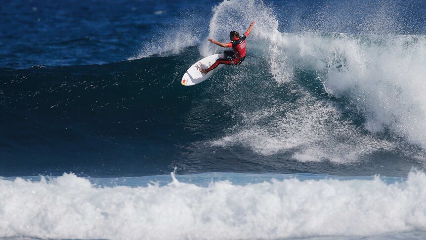 American Carissa Moore catches a wave in the final of the Margaret River Pro on April 6, 2014.