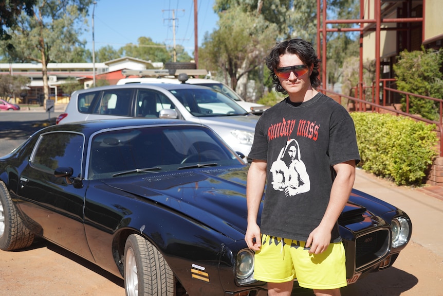 Hugo Byrnes next to his car