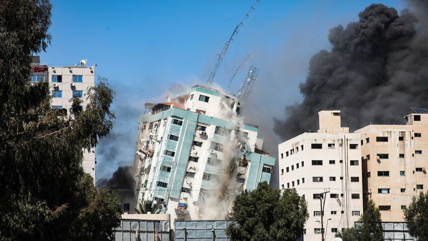 An Israeli airstrike destroys a media building that housed Associated Press and Al Jazeera in Gaza.
