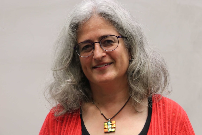 A head and shoulder shot of a smiling Deborah Hersh.