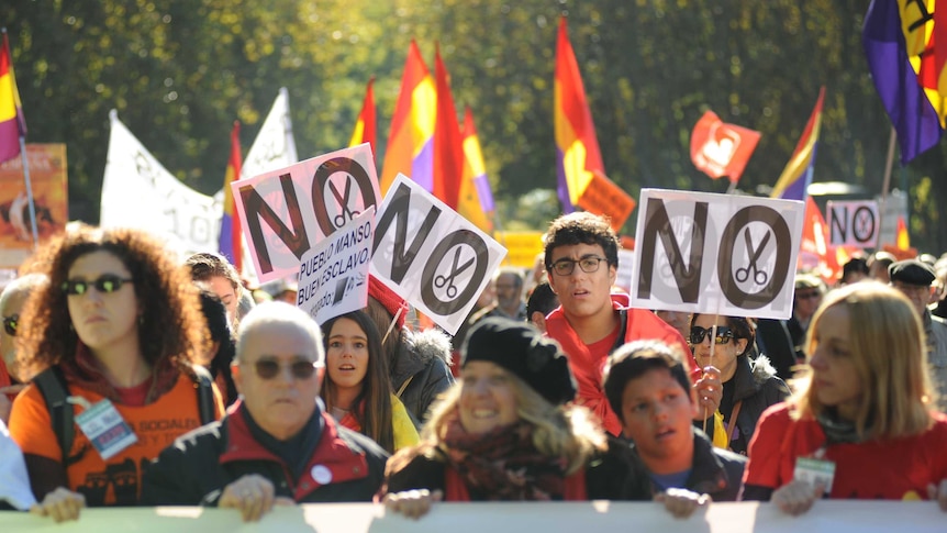 Thousands rallied in Madrid in 2013, calling for the Spanish government to resign over its austerity policies.