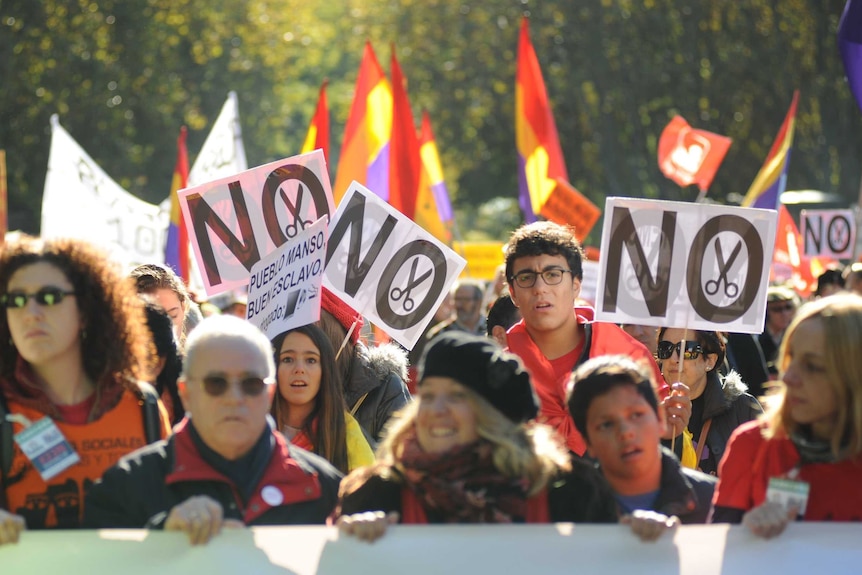 Thousands rallied in Madrid in 2013, calling for the Spanish government to resign over its austerity policies.