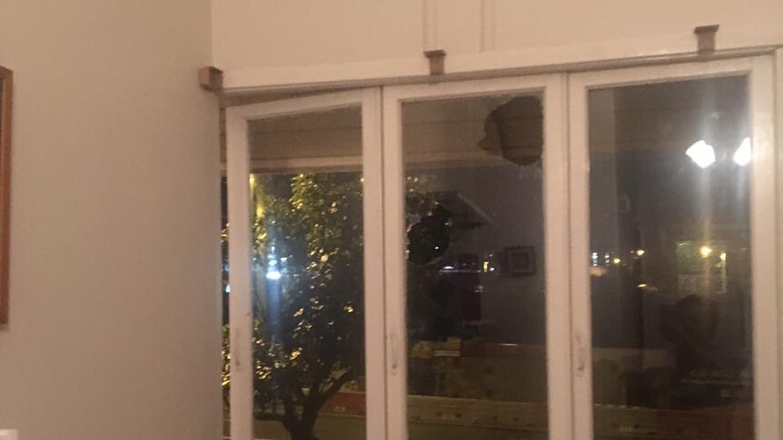 Two windows were broken in a homophobic attack at Olivia Hill's Woolloongabba home on Sunday night.