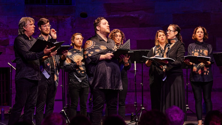 The Song Company perform 'Songs from the Heart' at the Cell Block Theatre, October 2022. L-R: Antony Pitts, Alasdair Stretch, Ethan Taylor , Elias Wilson, Jessica O’Donoghue, Amy Moore, Sonya Holowell, Susannah Lawergren  (Song Company: Keith Saunders).