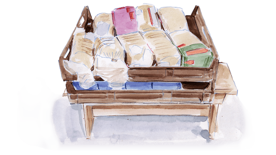 An illustration of a tray of loaves of bread delivered to the Chisolm refuge.