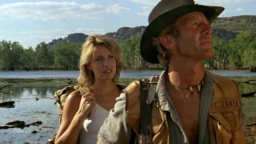 A still from the 1986 film Crocodile Dundee featuring Linda Kozlowski and Paul Hogan.