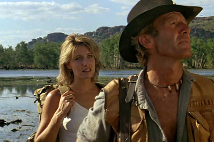 A still from the 1986 film Crocodile Dundee featuring Linda Kozlowski and Paul Hogan.