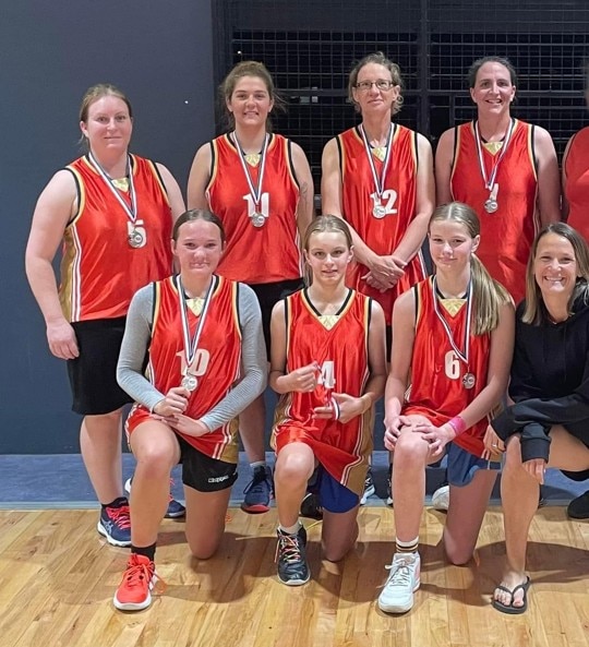 women in basketball uniforms