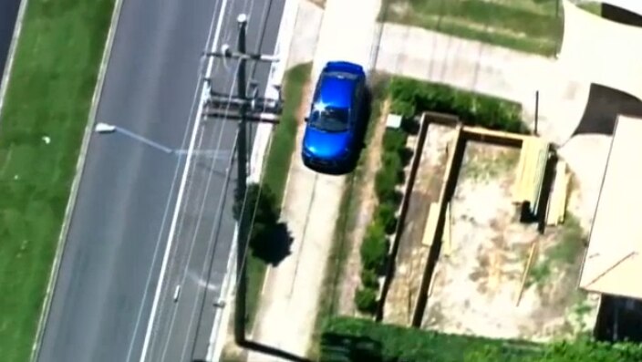 The car mounted the footpath in the streets of Deception Bay, north of Brisbane, during the police chase.