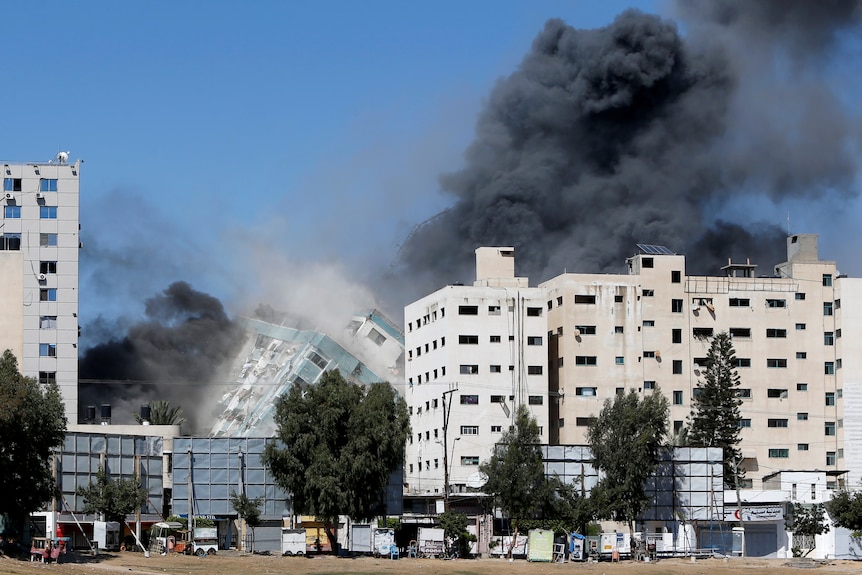 Building housing media in Gaza collapses