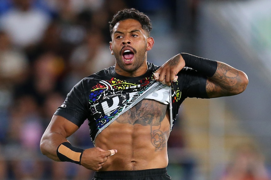 Josh Addo-Carr of the Indigenous All-Stars points to his tattoo during All Stars