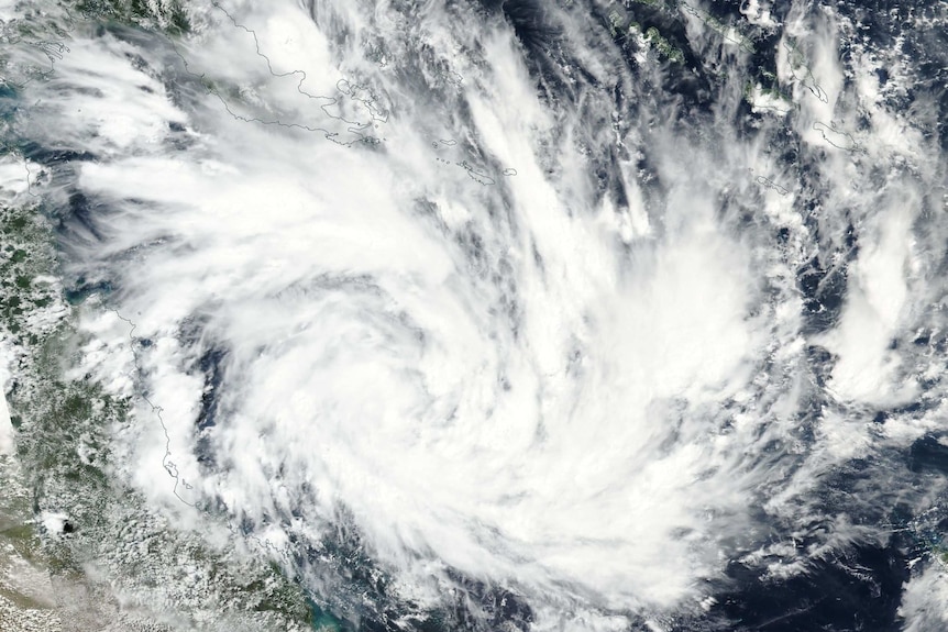 Cyclone Debbie seen from space forming off the coast