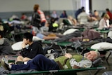 Evacuees rest in a shelter near the Oroville Dam