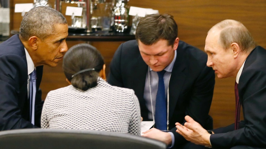 US president Barack Obama talks with Russian president Vladimir Putin at the G20 summit.