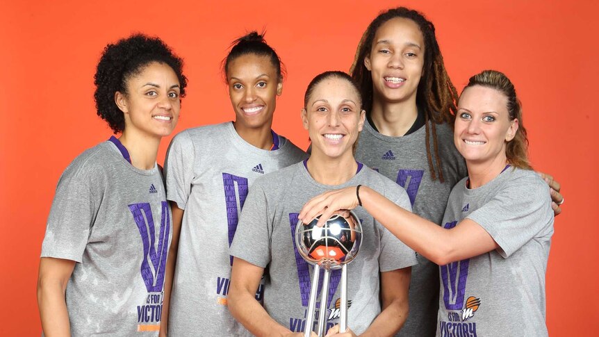 Taylor and the Mercury with the WNBA trophy