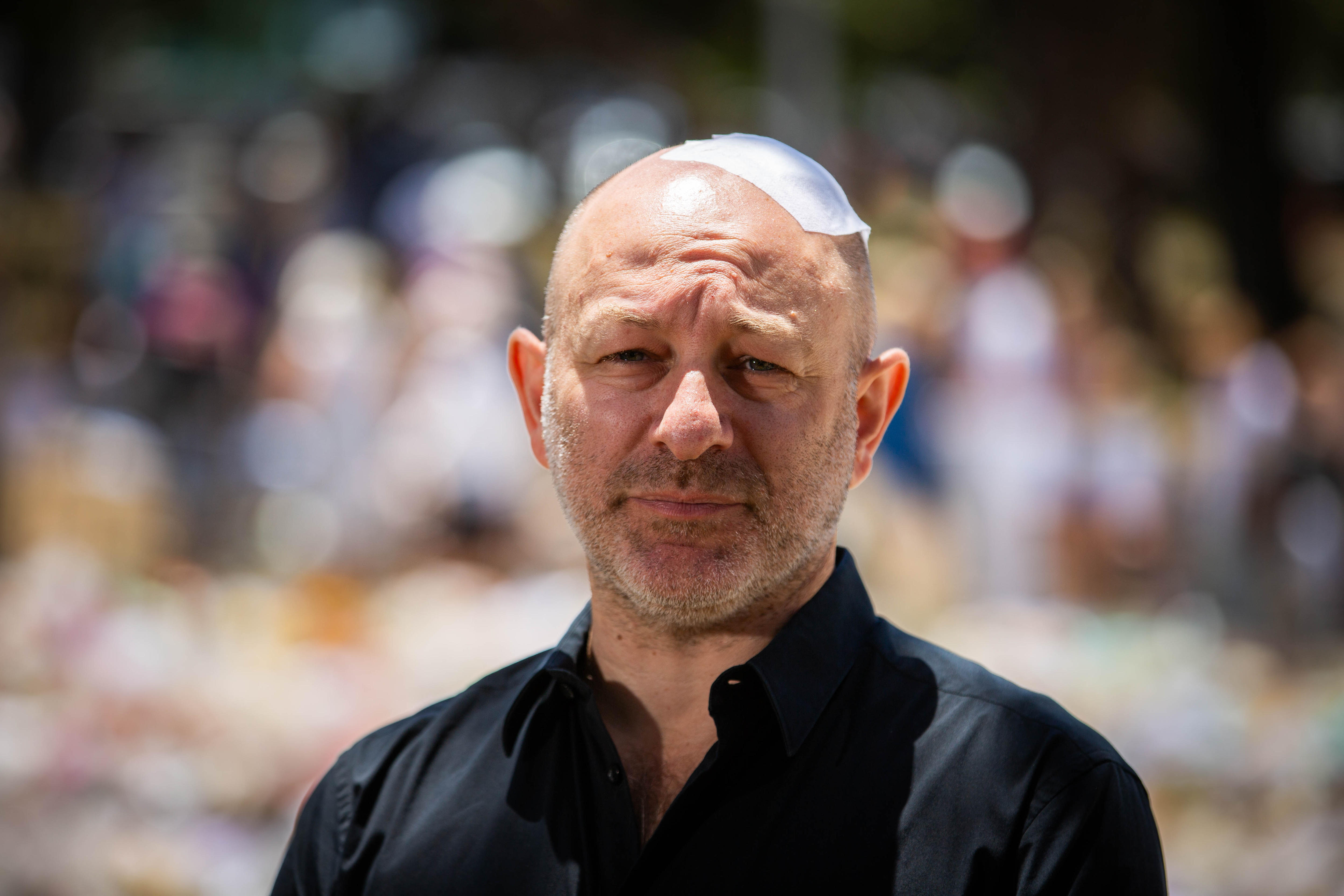 Wounded Bondi survivor 'millimetres' from death as he raced to family