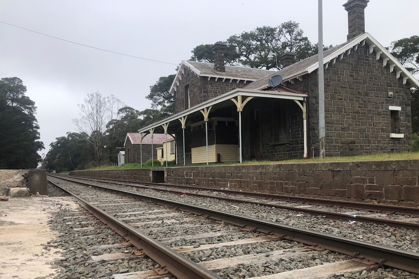Abandoned but intact bluestone railway station
