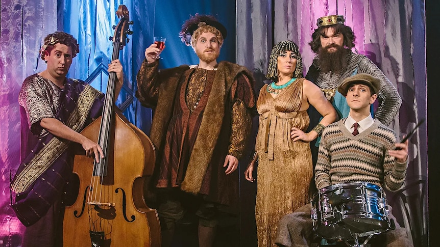 A cast of historic characters from Caeser to Cleopatra in an ensemble