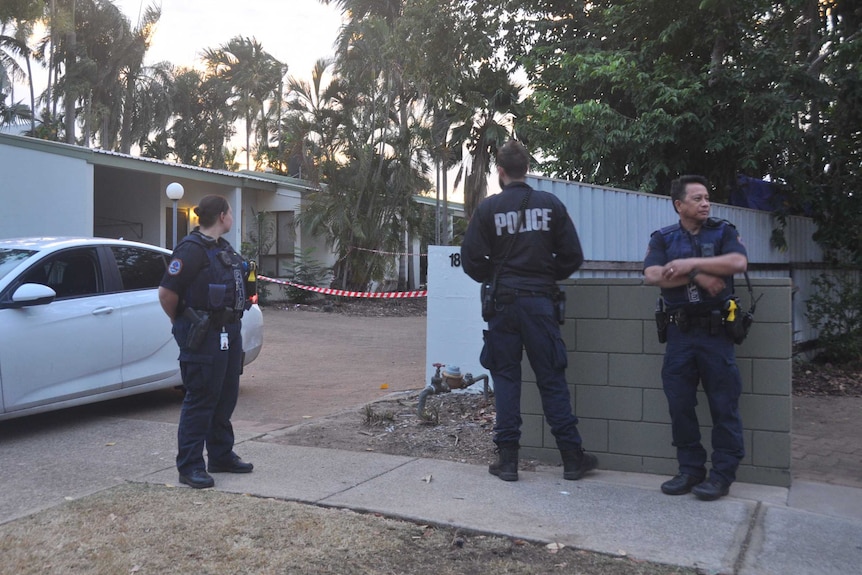 Police on duty at a crime scene at Gardens Hill Crescent, where a man was shot and killed.
