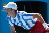 Tomas Berdych serves during his Australian Open quarter-final against David Ferrer