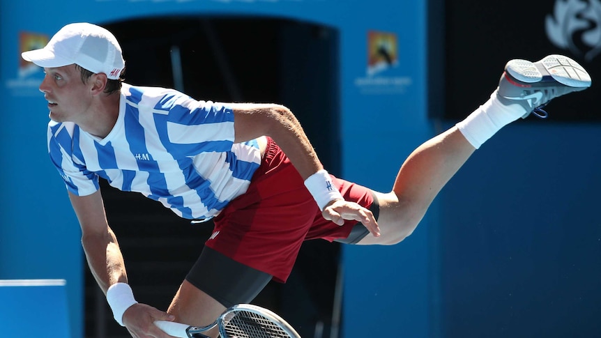 Tomas Berdych serves during his Australian Open quarter-final against David Ferrer