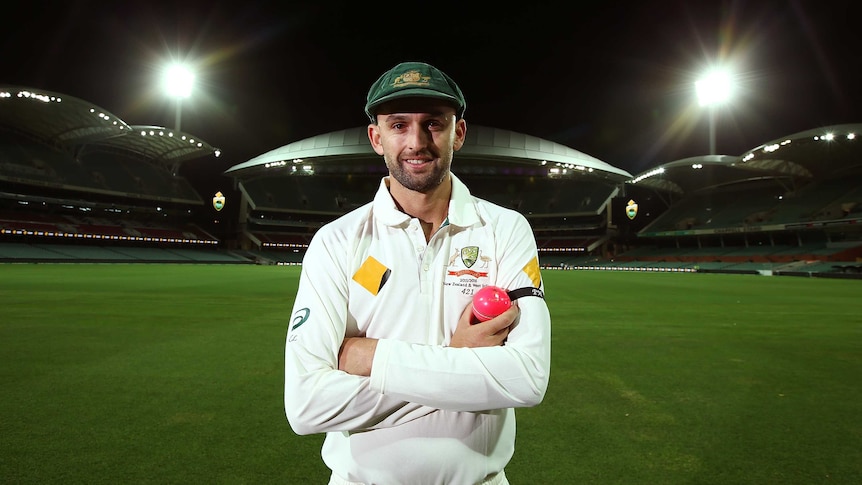 Nathan Lyon poses under lights after an Australian nets session at Adelaide Oval in November 2015.