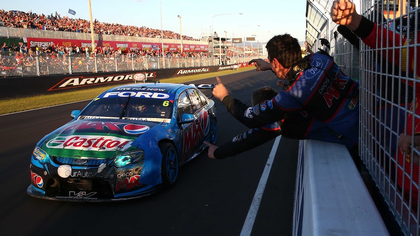 Ford's Chaz Mostert crosses the line to win the 2014 Bathurst 1000 at Mount Panorama.