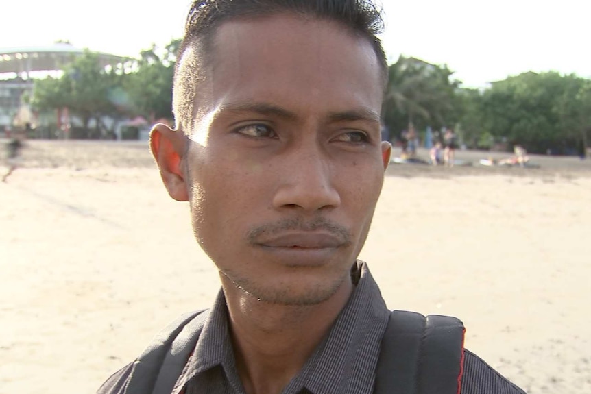 Convicted people smuggler Ali Jasmin standing on a beach in Bali. May 2017