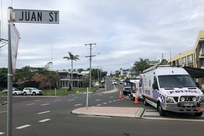 Police vans at Juan Street, Alexandra Headland