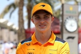 Oscar Piastri smiling  before the Bahrain Grand Prix