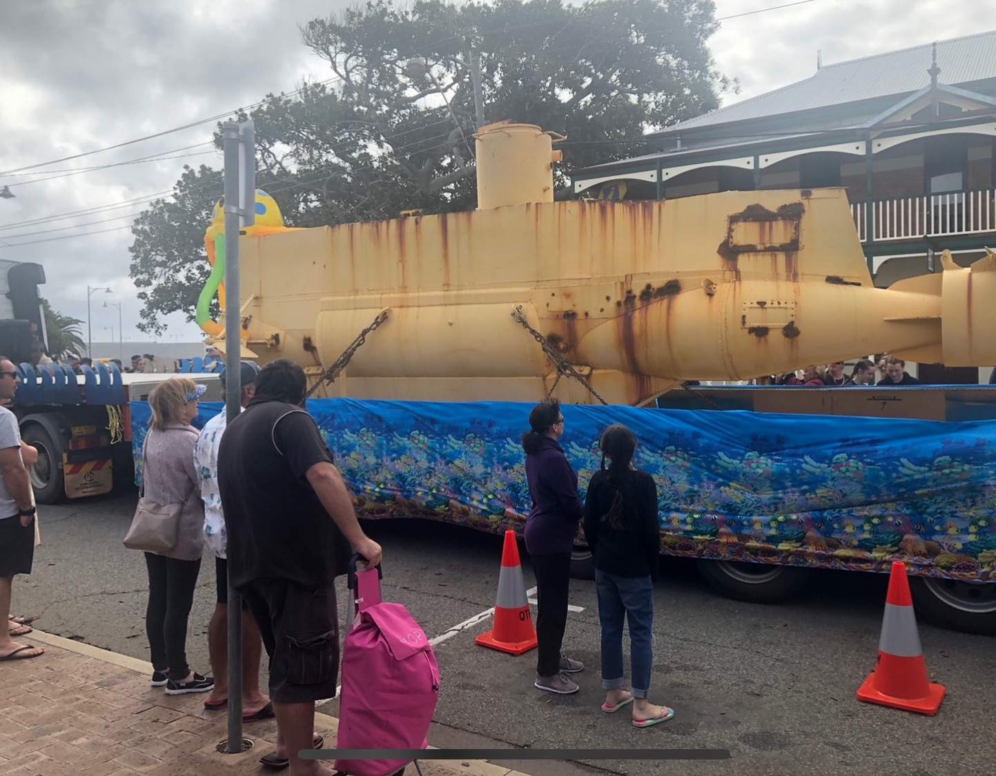 Yellow submarine the centre of tug of war between two coastal towns