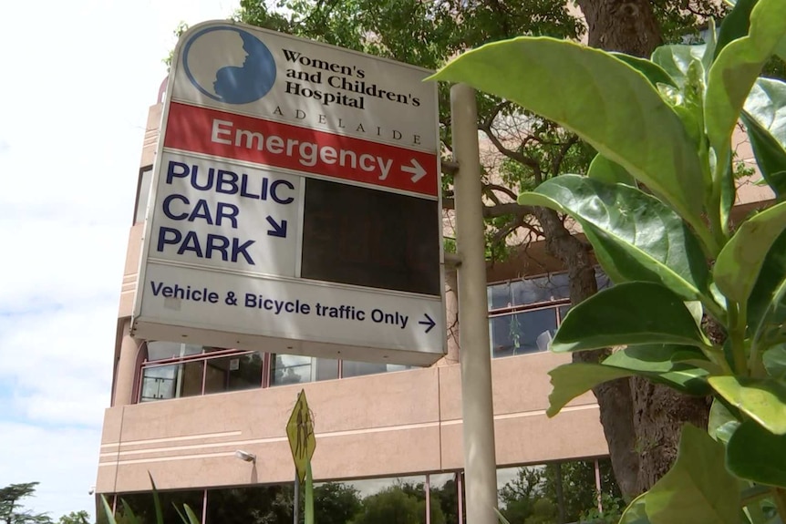 A sign saying Hospital for Women and Children and Public Parking