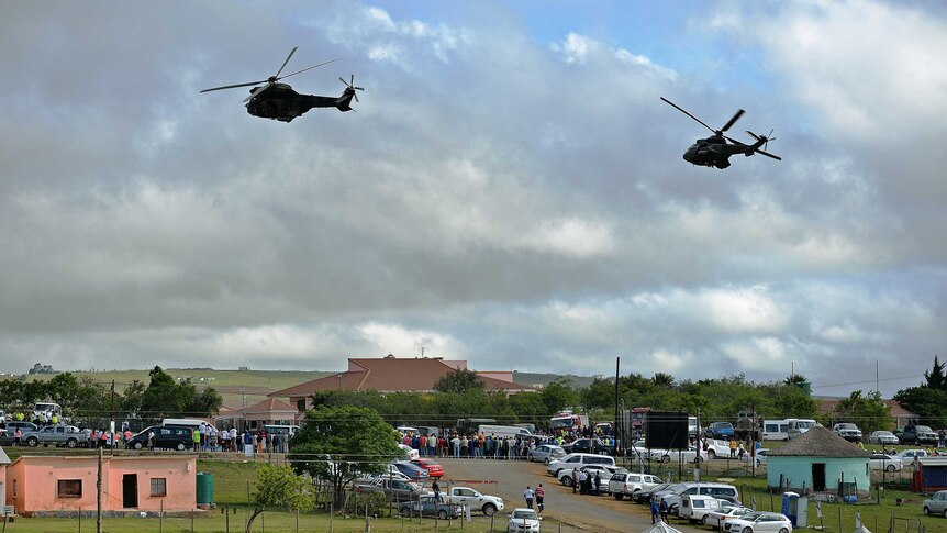 Military helicopters fly over former home of Nelson Mandela