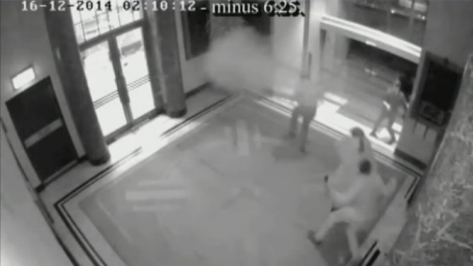 CCTV capture of shotgun blast during Lindt Cafe siege