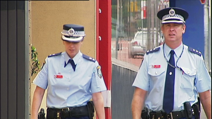 Police Inspector Toby Austin arriving at Sydney's Glebe Coroner's Court for a finding into the death of Darren Neill