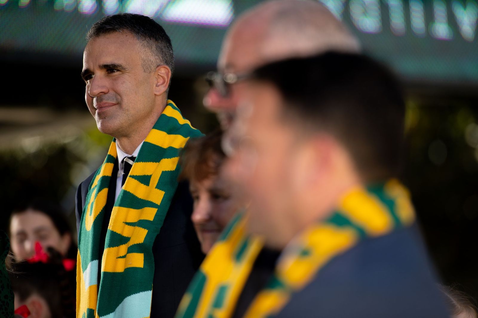 the premier wearing a scarf 