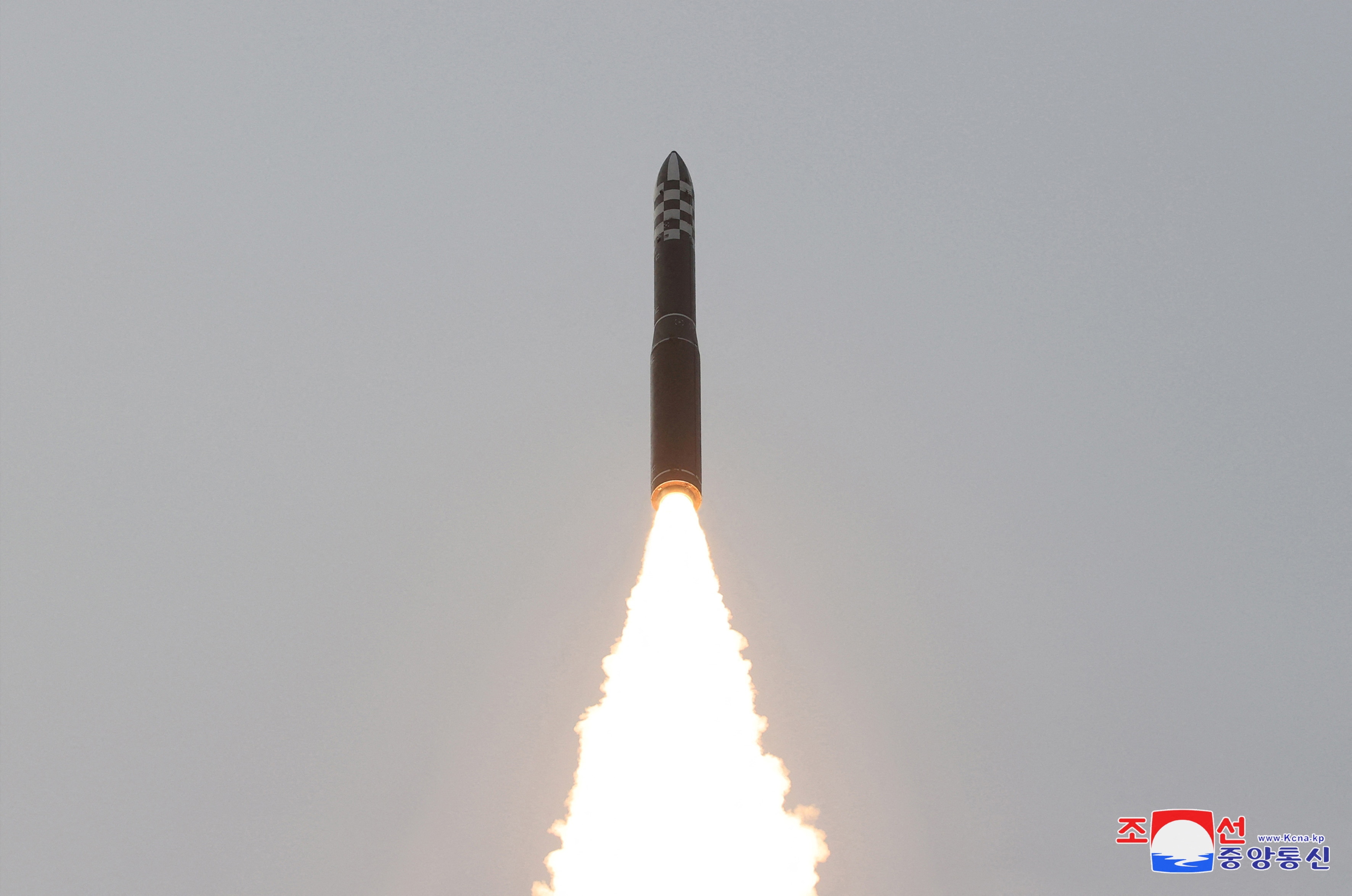 A Hwasong-18 intercontinental ballistic missile is launched into the air as part of a North Korea's test launch