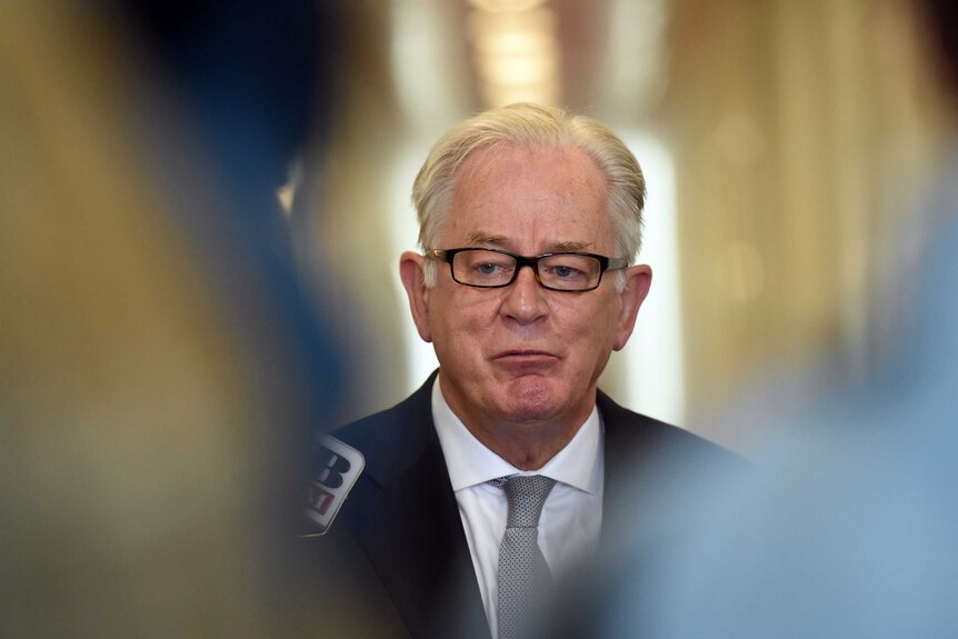 Andrew Robb at a press conference