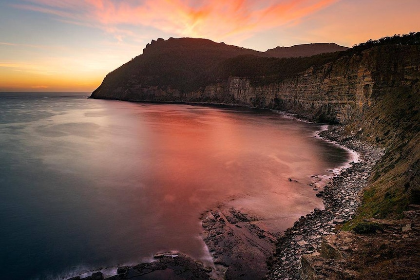 The coastline of Maria Island with a stunning sunrise.