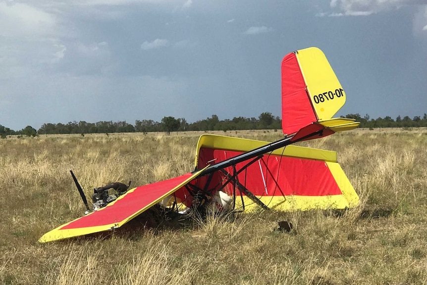 A red and yellow ultraplane crash site