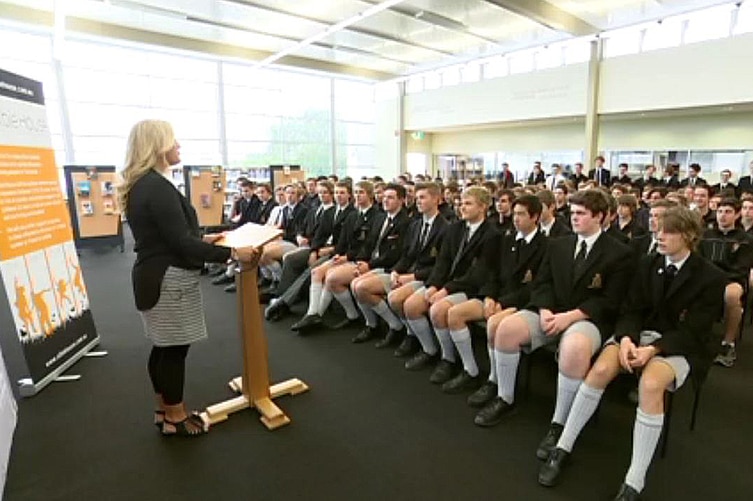 Albie House's Amanda Cuthbertson speaks to students at Hobart boys school.